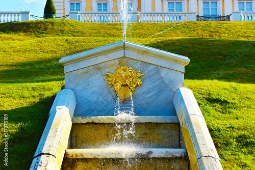 fountain with green lawn around