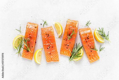 Salmon. Fresh raw salmon fish fillet on white background photo