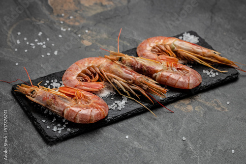 Shrimps, prawns. Seafood Red Argentine shrimps with ice, Wild shrimps, ocean jumbo shrimps. banner, menu, recipe place for text, top view