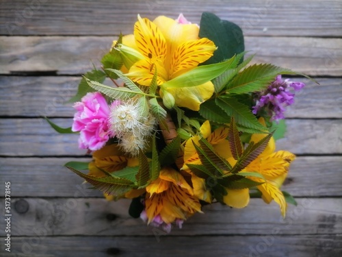 bouquet of flowers on a wooden table