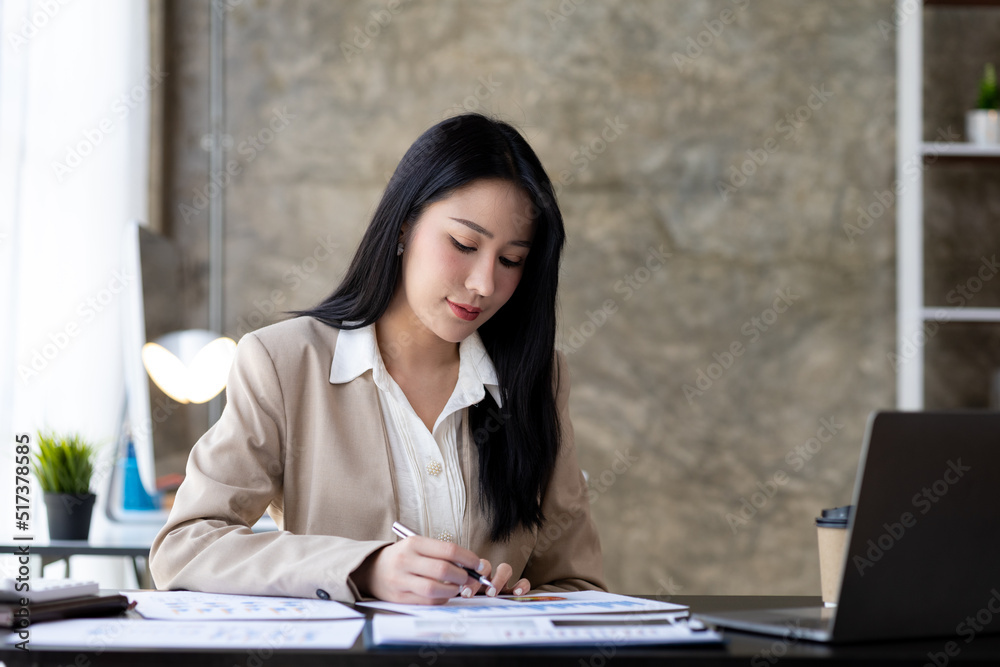 Beautiful Asian woman running a company, businesswoman who founded a new generation of startup companies, management run by female leaders, female bosses. Business administration concept. Beautiful Asian woman running a company, businesswoman who founded a new generation of startup companies, management run by female leaders, female bosses. Business administration concept.