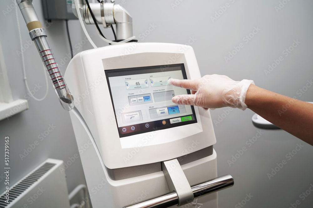 A modern laser device is ready for the antiaging gynecological procedures in a clinic A modern laser device is ready for the antiaging gynecological procedures in a clinic