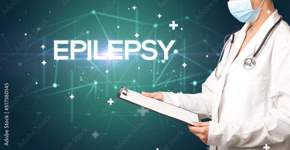 Doctor fills out medical record Doctor fills out medical record