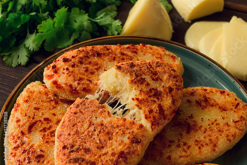 Chvishtari, corn flour tortillas with cheese, pastries, Georgian cuisine, Mchadi, homemade, top view, on a wooden table, no people,