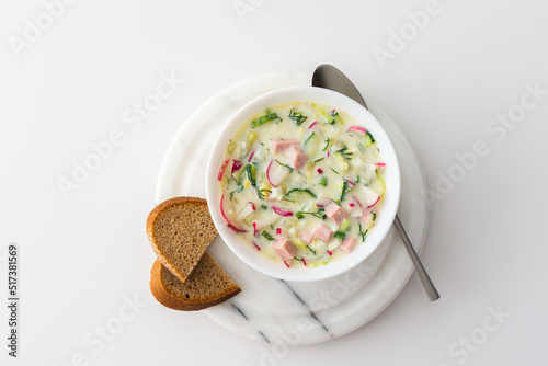 Cold soup Okroshka, soup with fresh vegetables and kefir, delicious summer traditional Ukrainian or Russian soup