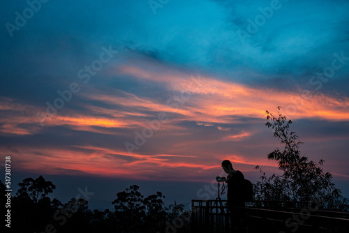 Fototapeta Naklejka Na Ścianę i Meble -  silhouette of a person on a sunrise