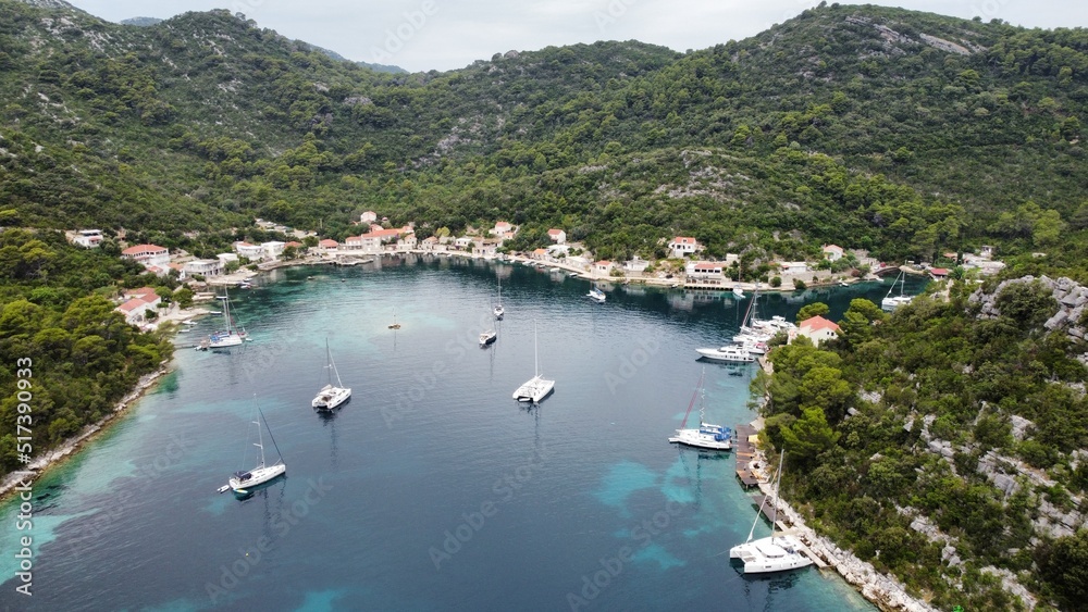 Okuklje - small Croatian bay with yachts anchored Okuklje - small Croatian bay with yachts anchored