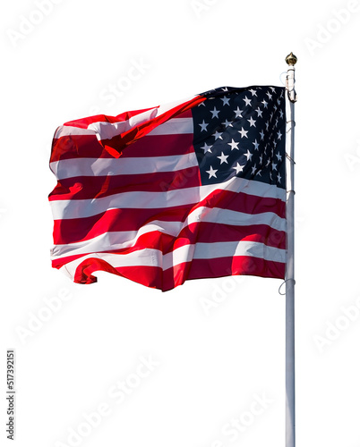 American national flag wawing on the wind isolated on vertical white background with copyspace. USA symbol of democracy, independence and liberty photo