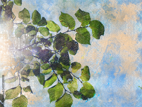 A tree branch with green foliage against the sky. A summer sky with bright sunshine.