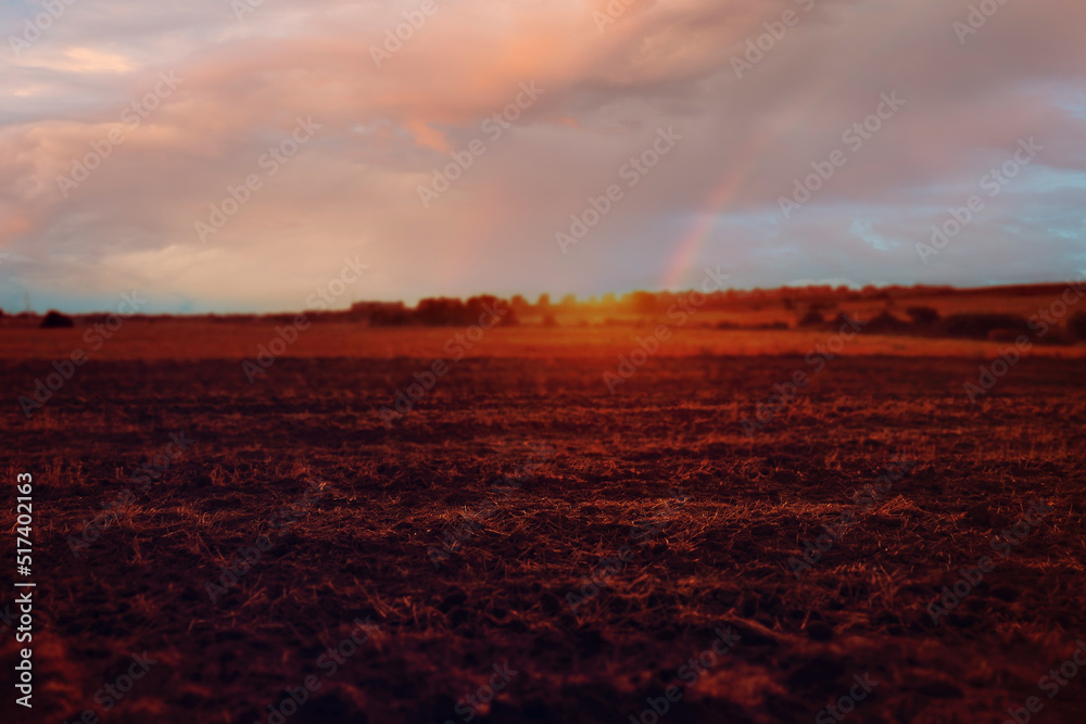 Obraz premium Arcoíris al atardecer