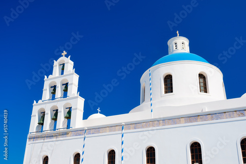 Fototapeta Naklejka Na Ścianę i Meble -  Church on the island of Mykonos, Greece. Narrow streets and traditional architecture. Photo as wallpaper.