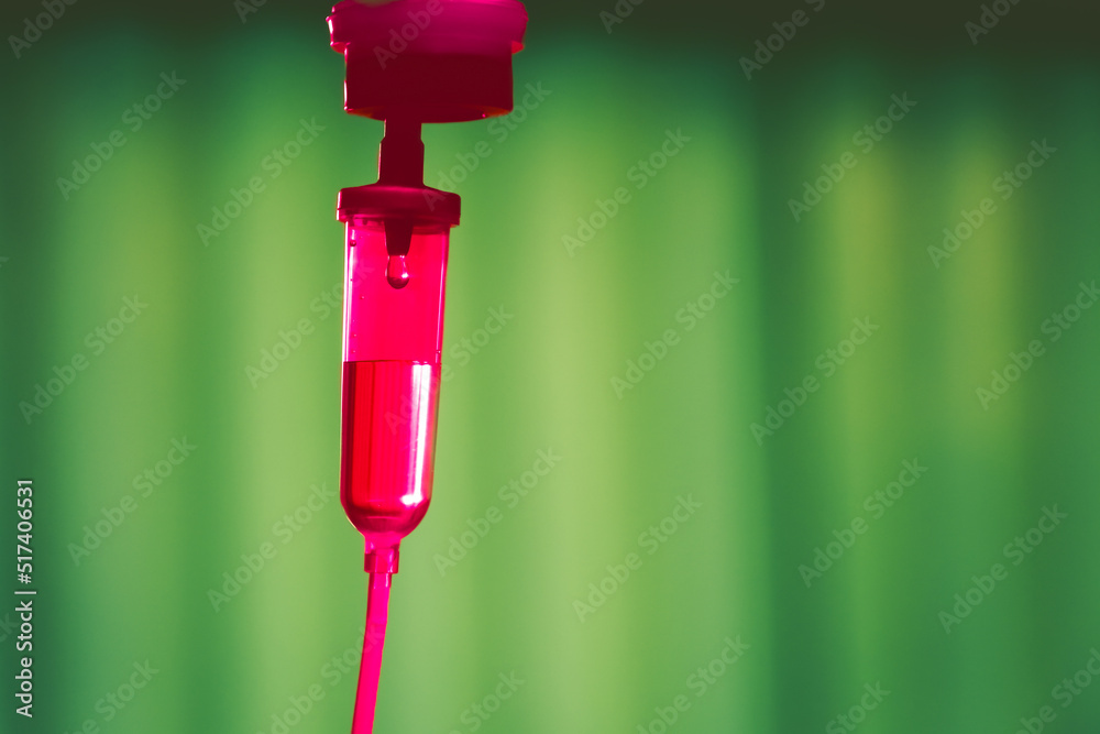 Set iv fluid intravenous drop saline drip hospital room,Medical Concept,treatment emergency and injection drug infusion care chemotherapy, concept.blue light background,selective focus Set iv fluid intravenous drop saline drip hospital room,Medical Concept,treatment emergency and injection drug infusion care chemotherapy, concept.blue light background,selective focus