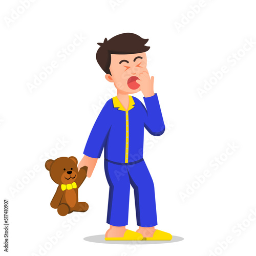 a sleepy boy in pajamas and a teddy bear in his hands