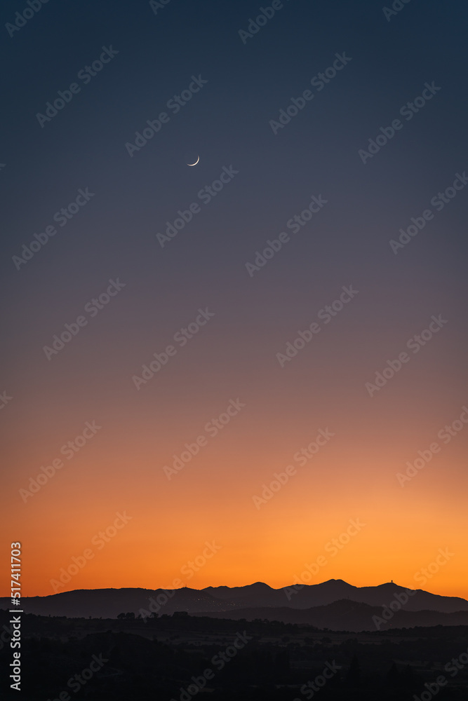 Sunset with moon in different colour high quality