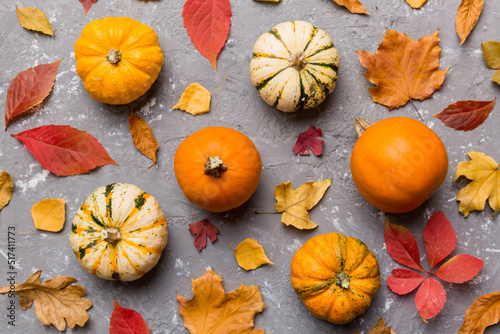 Autumn composition. Pattern made of dried leaves and other design accessories on table. Flat lay, top view