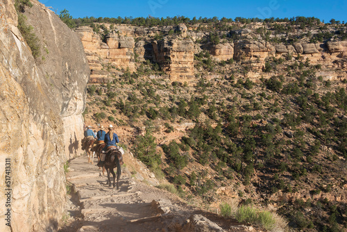 Tourists riding a horse in the mountain