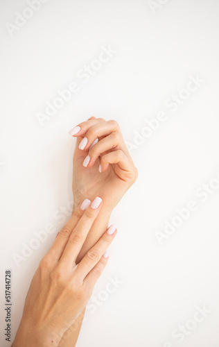beautiful female hand isolated on white background
