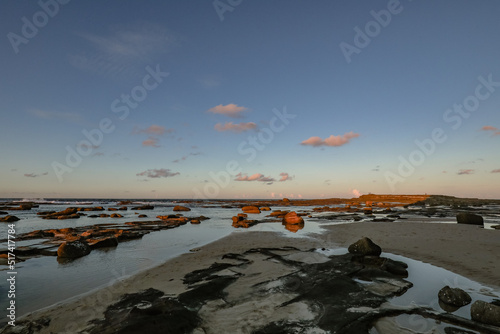 Sunset over rocky shelf at Norah Head, New South Wales Australia © Caseyjadew