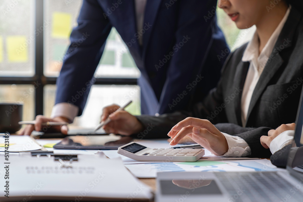 team of financiers are analyzing the company's earnings at meetings, intercompany business meetings. team of financiers are analyzing the company's earnings at meetings, intercompany business meetings.