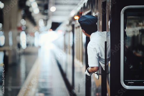 Foto 電車と車掌