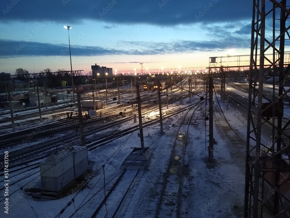 railway station from above at dawn with blue clouds