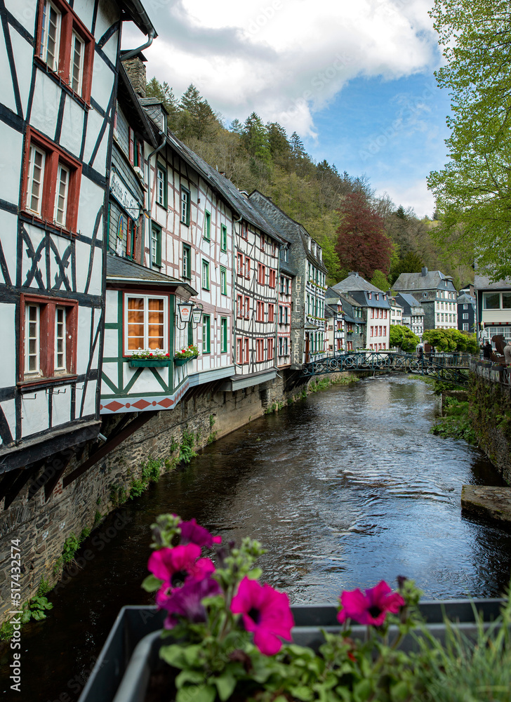 View of the old town of Monschau with Fachwerk  houses on the river in Germany