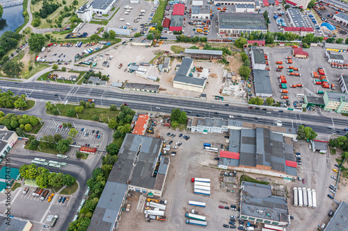 industrial area with many industrial buildings and warehouses. aerial view from flying drone.