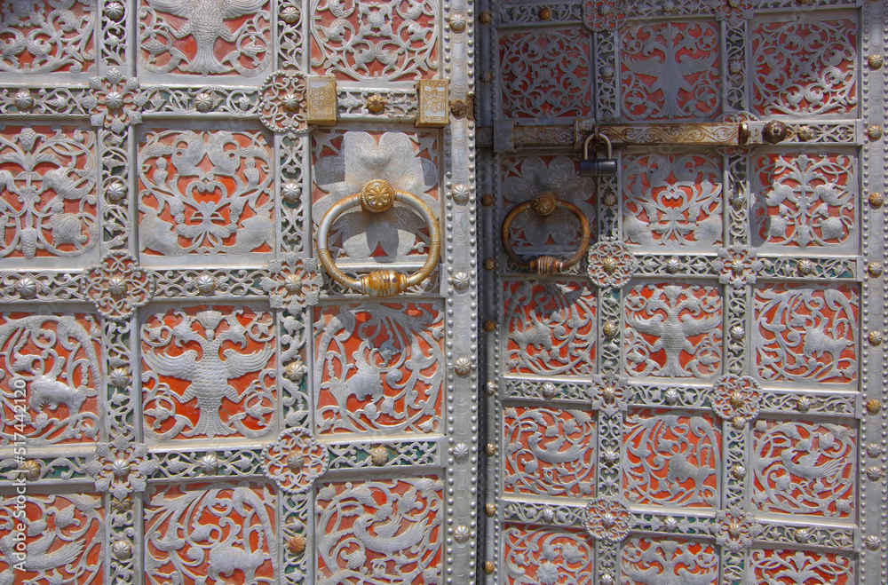 Antique door with carved metal trim. Astrakhan.