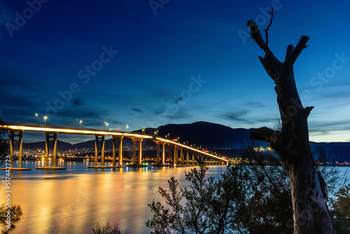 Fototapeta Tasman bridge at night over the river Derwent in Hobart