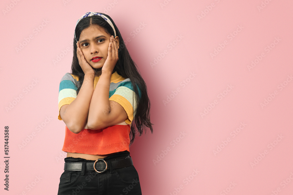 Young Indian Asian dreamy wondered pretty fascinating magnificent glam girl posing isolated with palms on face pleased. Beauty, fashion and lifestyle concept. Mock up copy space. Young Indian Asian dreamy wondered pretty fascinating magnificent glam girl posing isolated with palms on face pleased. Beauty, fashion and lifestyle concept. Mock up copy space.
