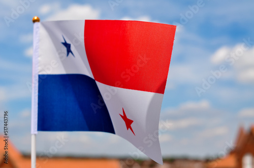 national flag of Panama consists of red and blue quaters and two stars photo