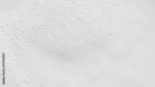 White dairy smooth foam on top of milk, foamed milk, steamed milk