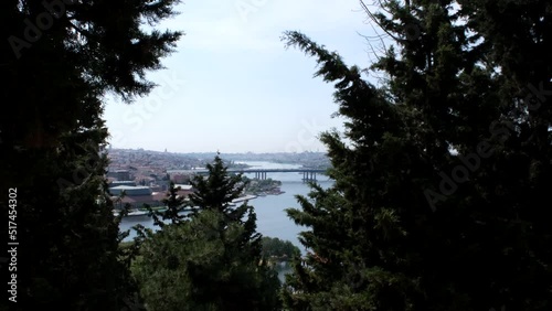 Bridge view between trees from Pierre Loti, beautiful Istanbul landscape 4k 60 fps video, skyline in Eyupsultan, Golden Horn from top view photo