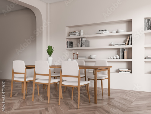 Guest room interior with chairs, eating table and shelf with modern decoration
