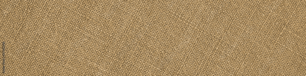 Light brown woven surface close up. Linen textile texture. Fabric handicraft glamorous banner. Textured braided home header. Macro Light brown woven surface close up. Linen textile texture. Fabric handicraft glamorous banner. Textured braided home header. Macro