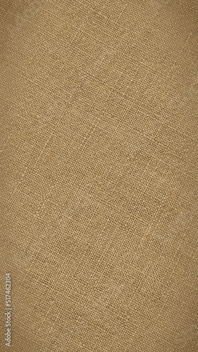 Light brown woven surface close up. Linen textile texture. Fabric handicraft glamorous background. Textured braided home backdrop. Len mobile phone wallpaper with vignetting. Macro