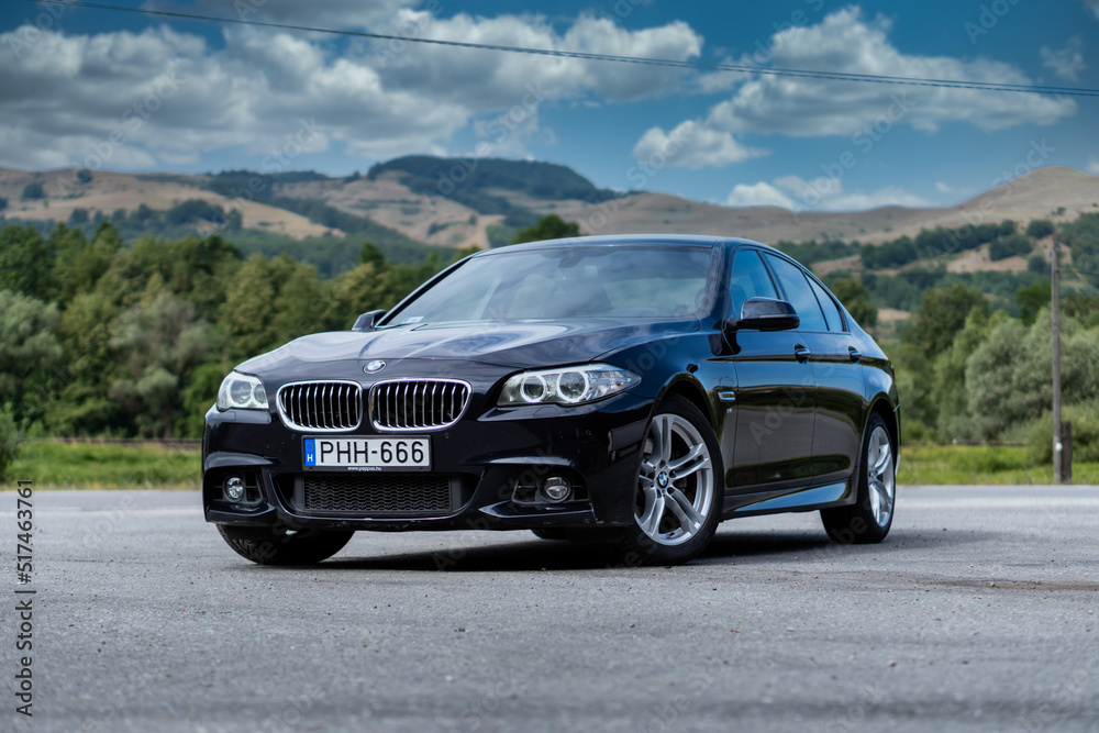 Cluj-Napoca, Cluj-Romania-06.06.2022-BMW F10, M package, isolated in an ...