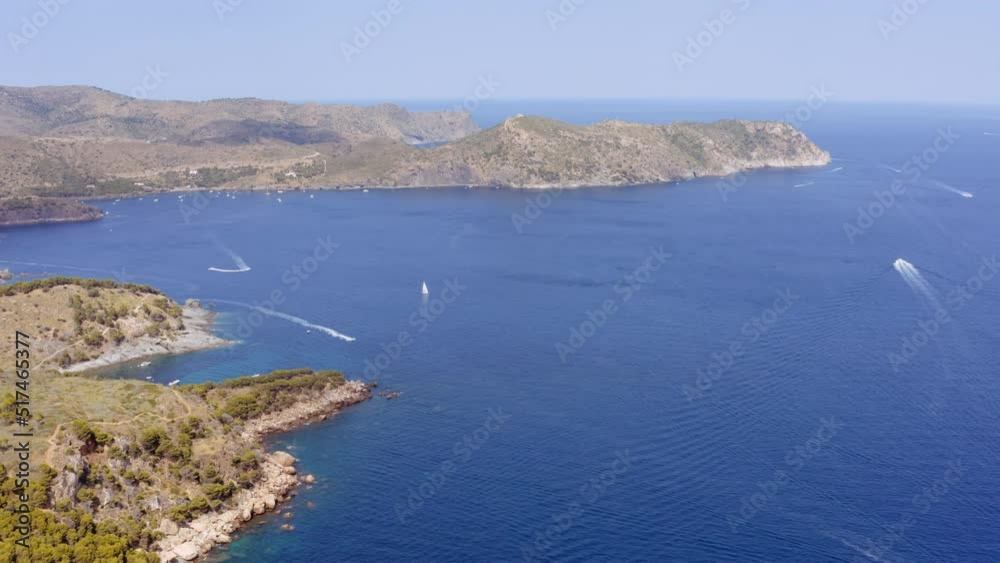Aerial of Mountains and Sea with Yachts Near Mediterranean Town of Roses, Spain Aerial of Mountains and Sea with Yachts Near Mediterranean Town of Roses, Spain