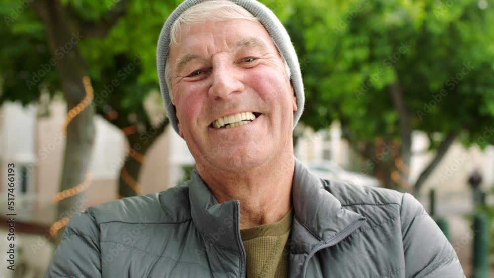 Closeup of a senior man showing off oral or dental hygiene with white teeth or dentures. Portrait of the face and head of a mature male laughing, feeling happy and content while travelling in the city Closeup of a senior man showing off oral or dental hygiene with white teeth or dentures. Portrait of the face and head of a mature male laughing, feeling happy and content while travelling in the city