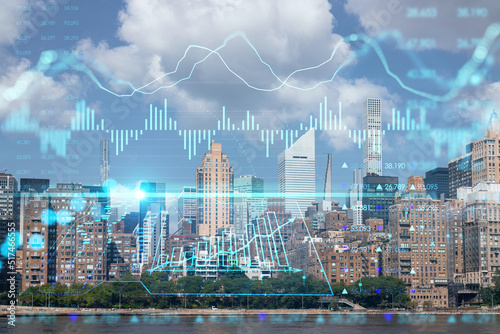 New York City skyline from Roosevelt Island over East River towards skyscrapers of Midtown Manhattan, day time. Forex candlestick graph hologram. The concept of internet trading, brokerage, analysis