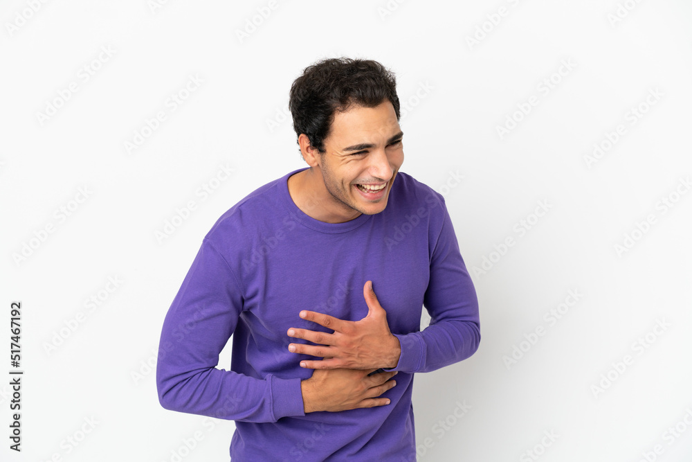 Fototapeta premium Caucasian handsome man over isolated white background smiling a lot