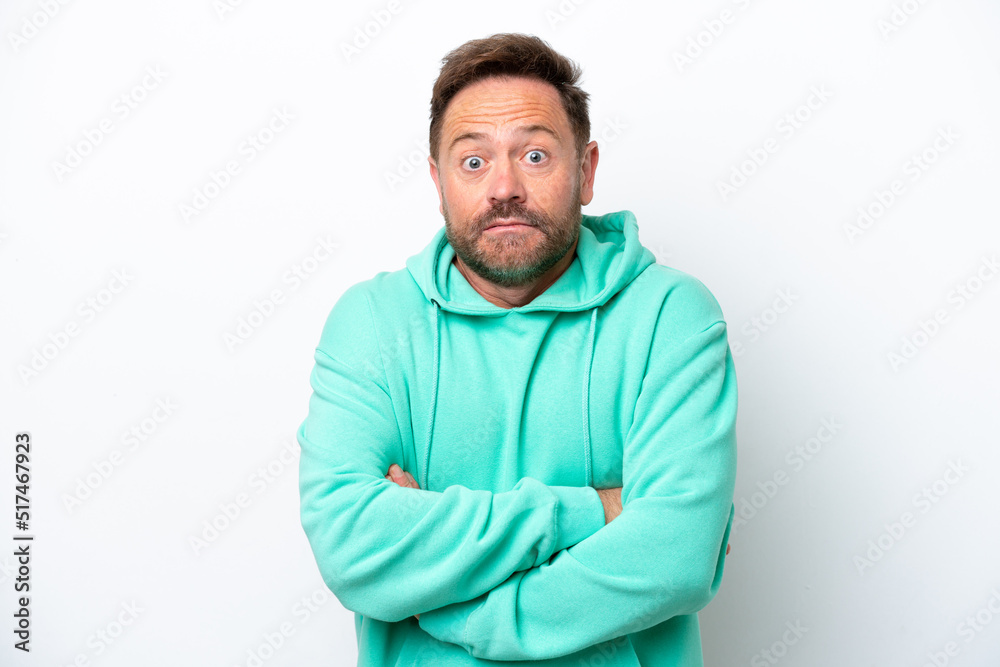 Middle age caucasian man isolated on white background making doubts gesture while lifting the shoulders