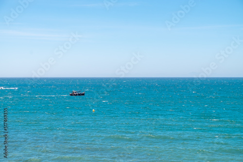 A boat sailing the Mediterranean Sea. photo