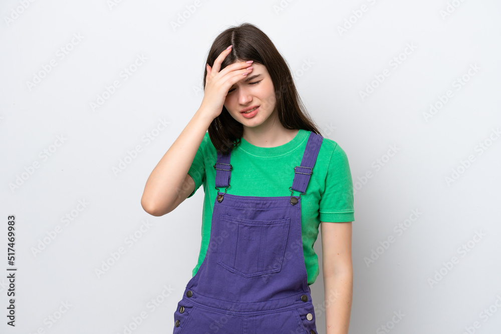 Young Russian woman isolated on blue background with headache Young Russian woman isolated on blue background with headache