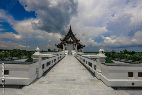 Background of a beautiful church in the middle of the water, important religious attractions in Udon Thani province of Thailand, Wat Pa Ban Tat,Atthaborin Luang Maha Bua Yannasampanno Museum Building. photo