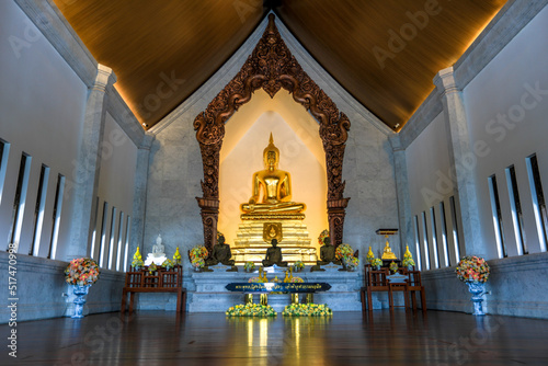 Background of a beautiful church in the middle of the water, important religious attractions in Udon Thani province of Thailand, Wat Pa Ban Tat,Atthaborin Luang Maha Bua Yannasampanno Museum Building. photo