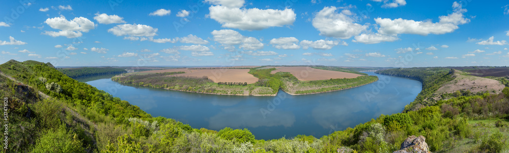 Naklejka premium Amazing spring view on the Dnister River Canyon with picturesque rocks, fields, flowers. This place named Shyshkovi Gorby, Nahoriany, Chernivtsi region, Ukraine.