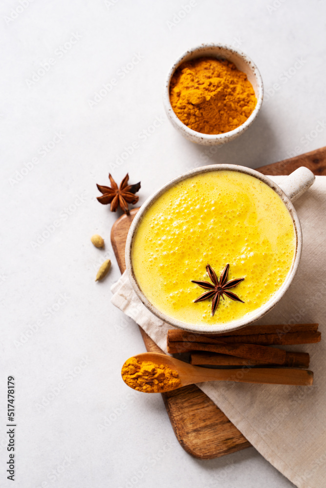 Turmeric health latte with spice and powder on white background, Turmeric health latte with spice and powder on white background,