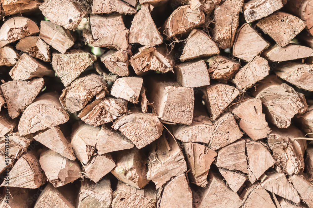 Background image of a log prepared as firewood were arranged in an orderly manner Background image of a log prepared as firewood were arranged in an orderly manner