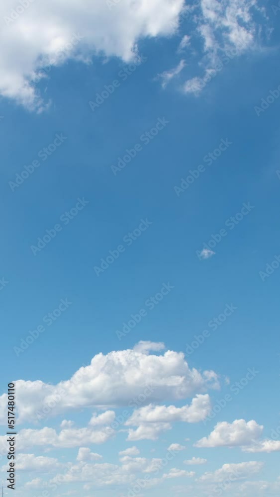 Clouds time lapse blue sky summer background vertical video for social media Clouds time lapse blue sky summer background vertical video for social media